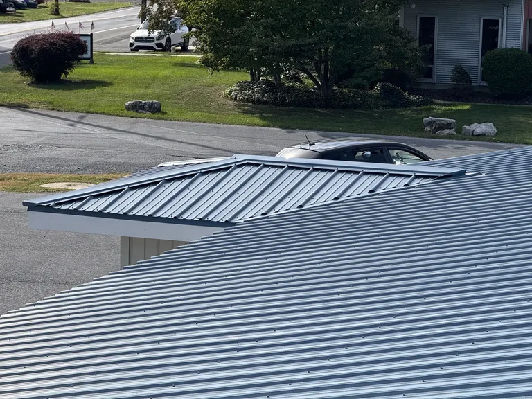 Professional roof installation with new shingles